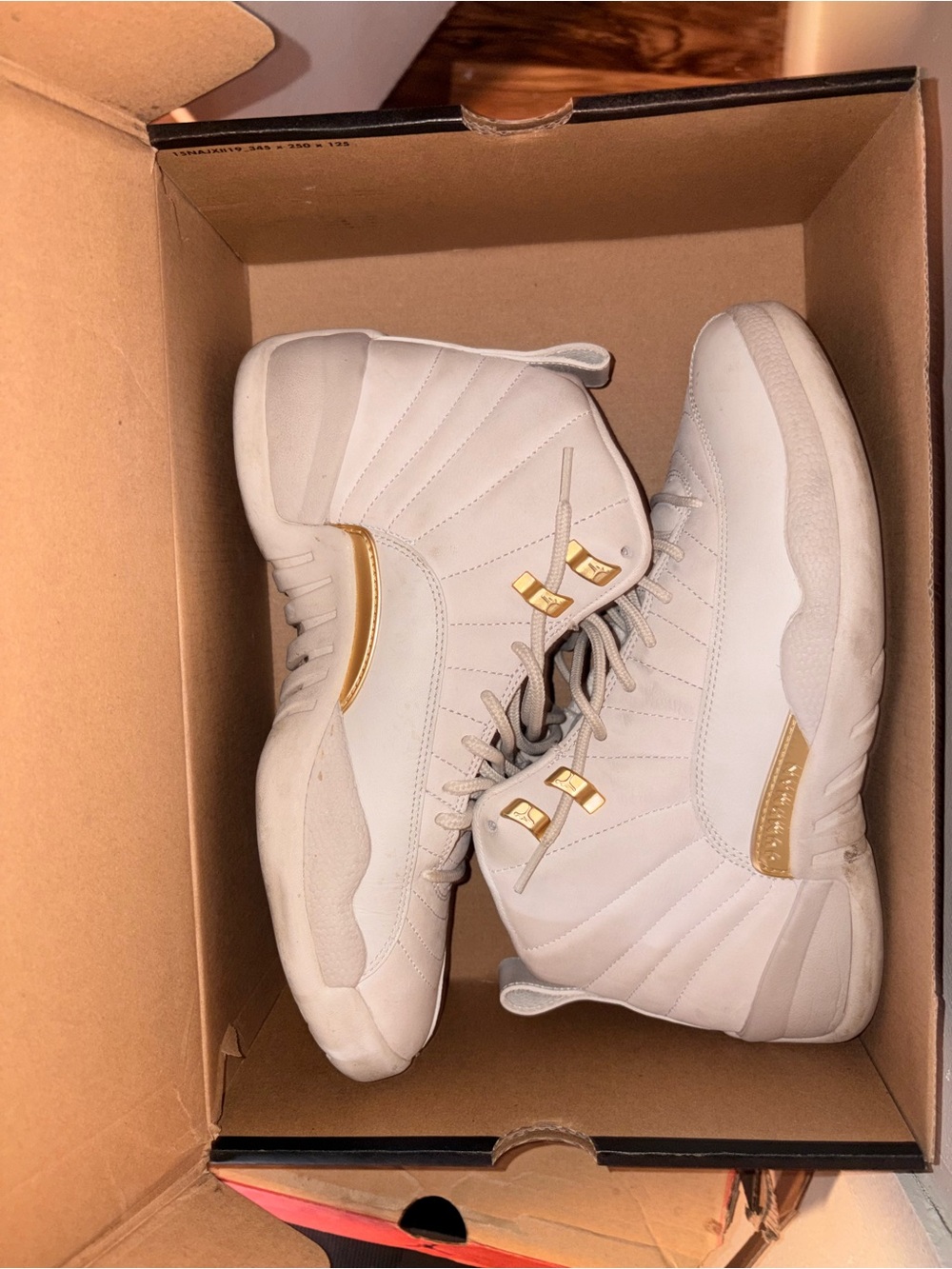 Jordan Retro Sneakers in White with Gold Accents
